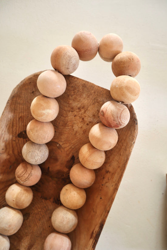 Collier artisanal en perles de bois